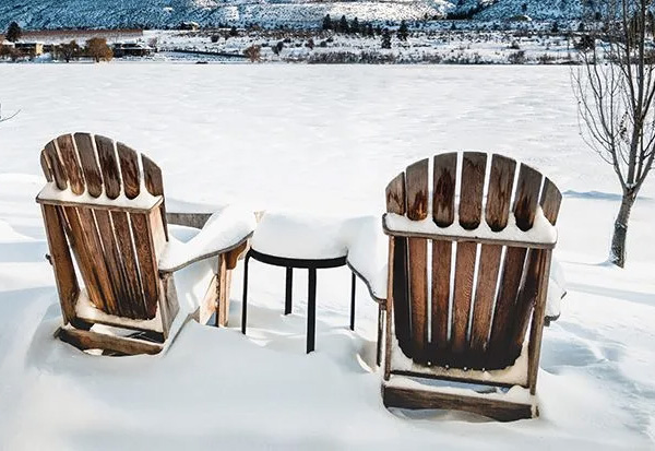 Teak chairs in the snow